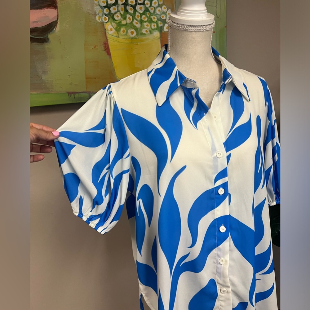 Blue and cream short sleeve blouses by Flying Tomato. Size L